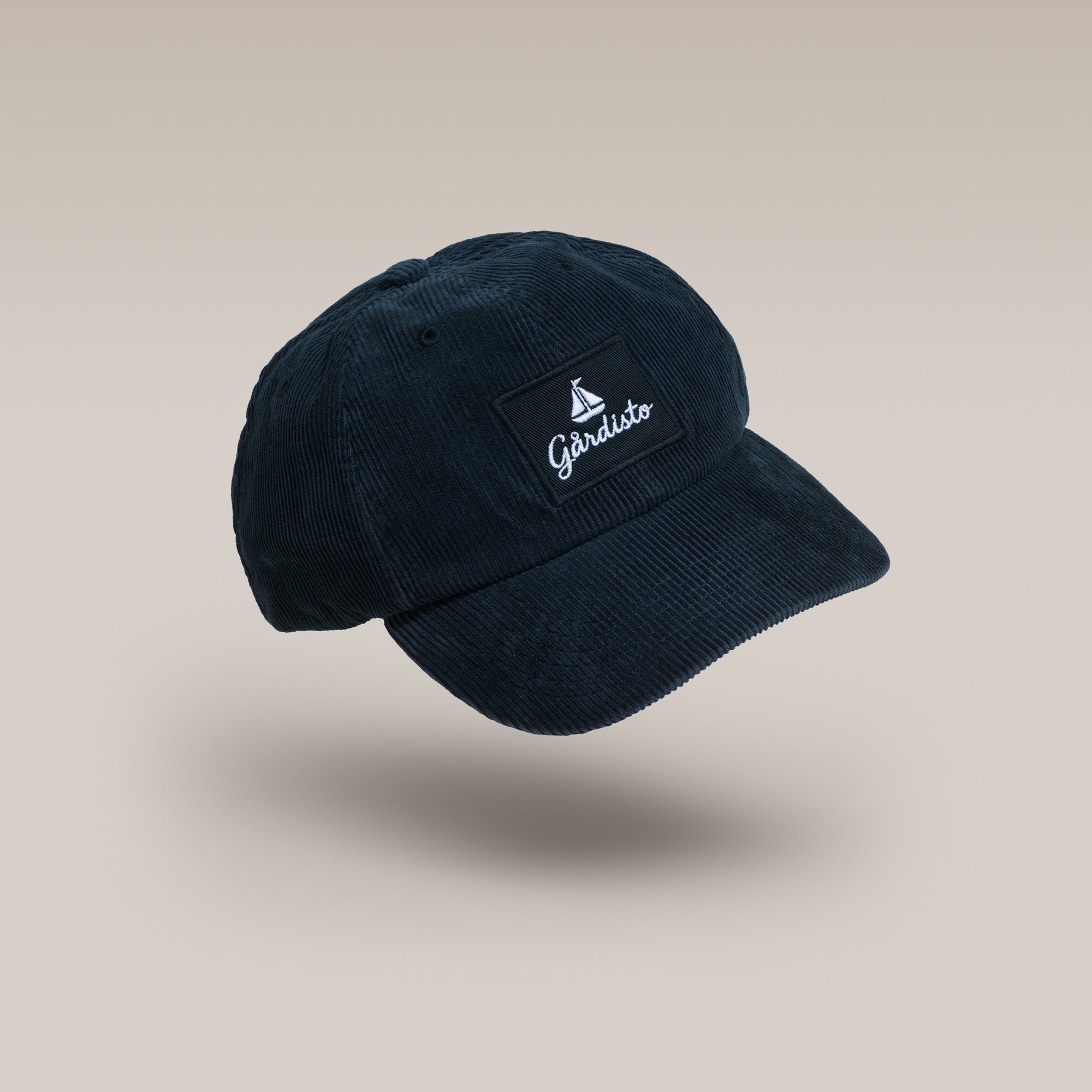Navy Gårdisto organic cotton corduroy cap, front three-quarter view